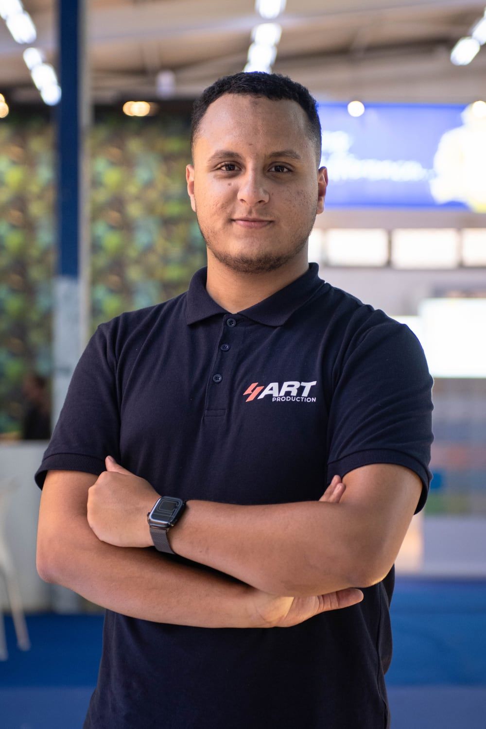 Nacer Krizou, founder of 4ART Production, at an exhibition stand