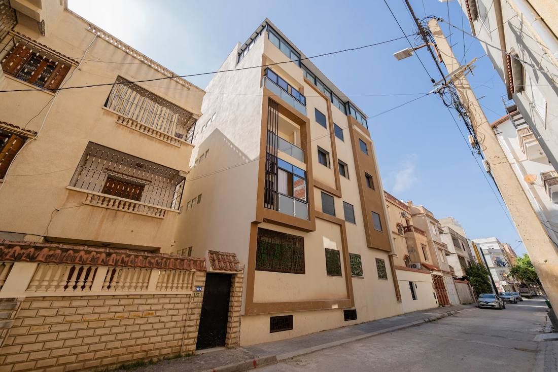 Apartment building facade on a sunny street